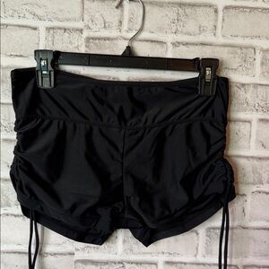 Black swim bottoms w/side pulls to decrease sides for an instant bikini bottom